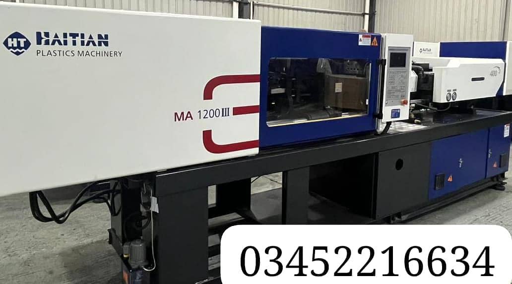 injection moulding machine 12