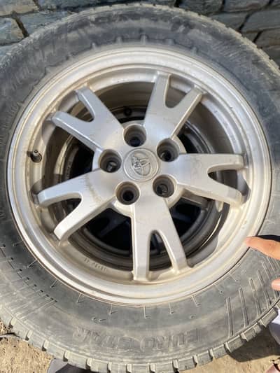 Tire and rims original toyota prius gari k. Very neet and clean