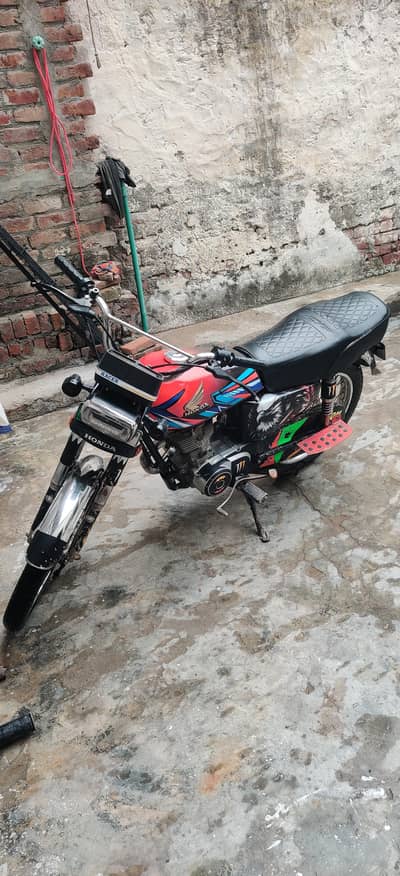 Honda 125 Card and Bio Available
