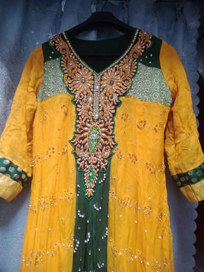 Georgette embroidered yellow touch stitched suit