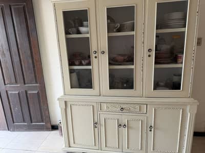 White three door showcase