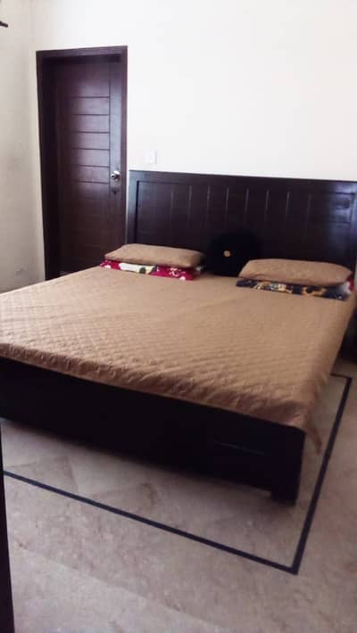 Wooden Double Bed for sale in reasonable price