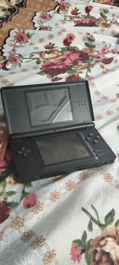 Nintendo DS lite- scuffed condition- comes with 2 Original GBA games