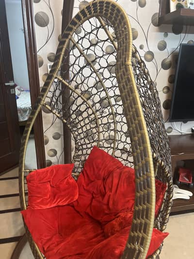 Red velvet cushioned chair