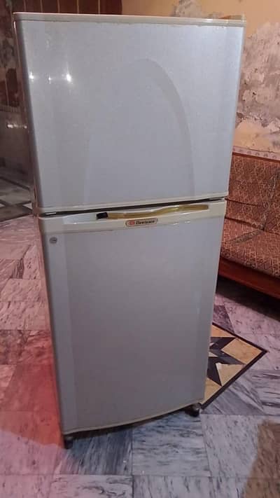 1 Dawlance Refrigerator (Medium Size)