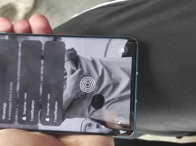 One Plus 8 8/128 dot shown in display excellent camera result