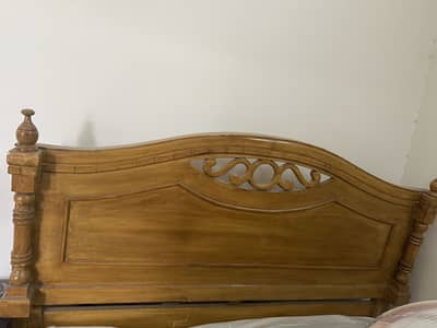 Queen size wooden bed