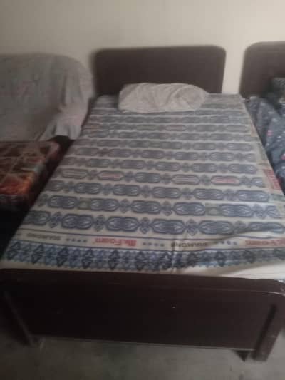 urgent for sell pair wooden bed
