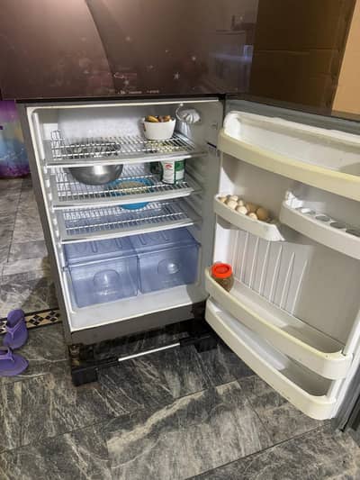 orient big size fridge good condition excellent cooling . .