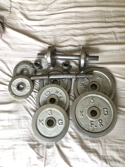 2 FREE RODs with 23kg (Total) Steel adjustable Dumbell plates for sale