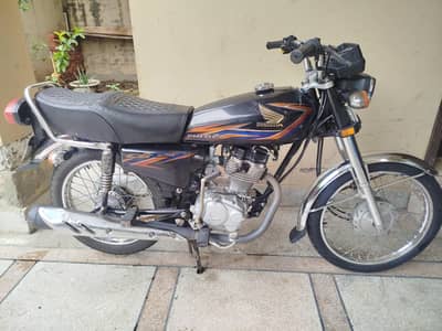 Honda 125.  Total genuine