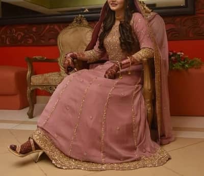 A wedding dress with heavy work it can be used as a party wear