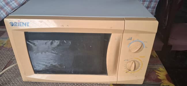 Orient Microwave Oven (OM720P-M) – Neat & Clean Condition