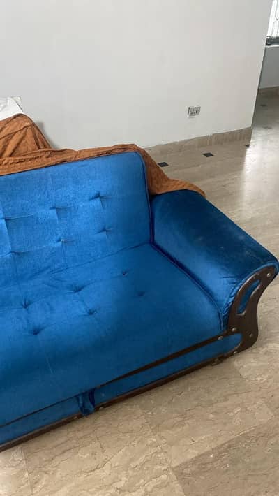 sofa combed with brown cover