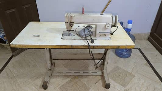 Juki salai machine in new condition with table stand