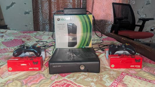 XBOX 360 slim RGH/JTAG 320gb with box and 2 controller