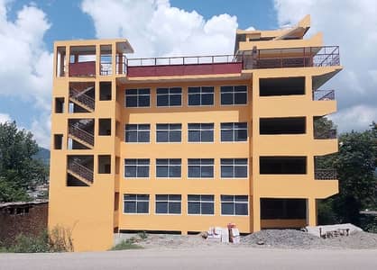 5-Storey Commercial Building with Underground Parking & Lift Access