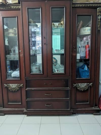 Wooden divider for crockery and showpiece