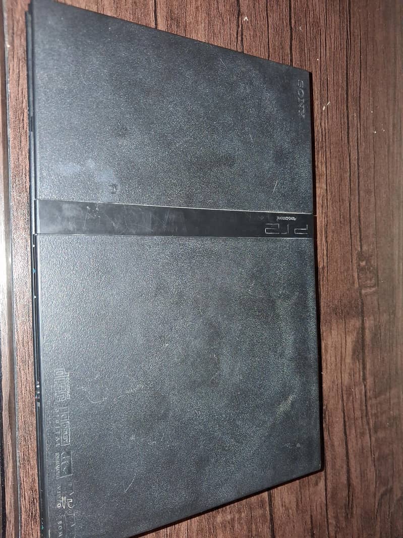 PlayStation 2 + 2 Controllers 0