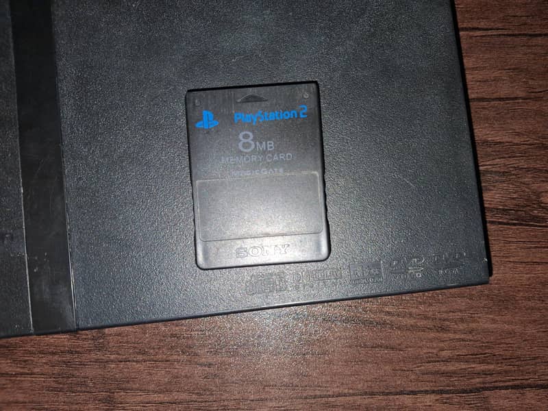 PlayStation 2 + 2 Controllers 4