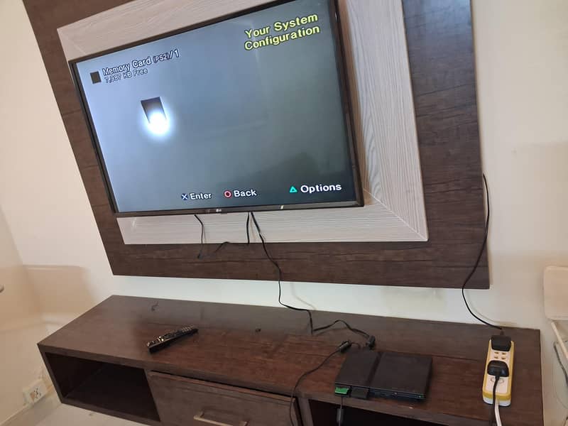 PlayStation 2 + 2 Controllers 5