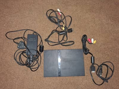 PlayStation 2 + 2 Controllers