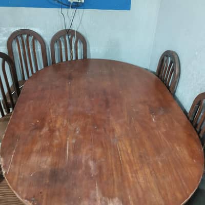 wooden dining table with 6 chairs
