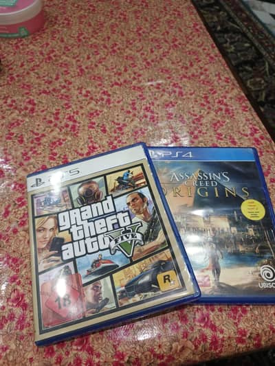 2 original PS5 CDS With case(GTA-5. . . . Assain creed)