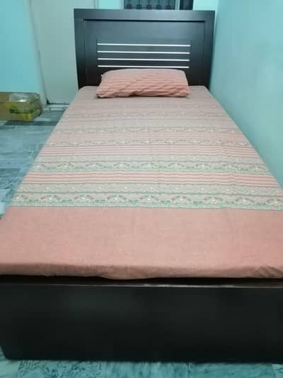 Single bed with mattress and 1,side Table
