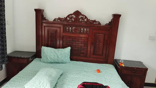 double bed with side tables dressing and show case for sale.
