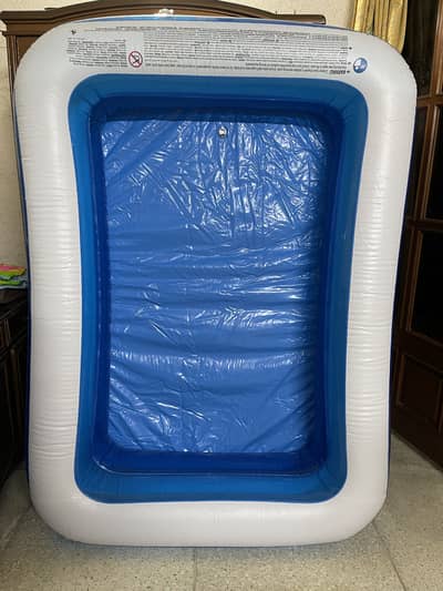 Imported Large Inflatable Pool. 4.8 foot by 6.5 foot length.