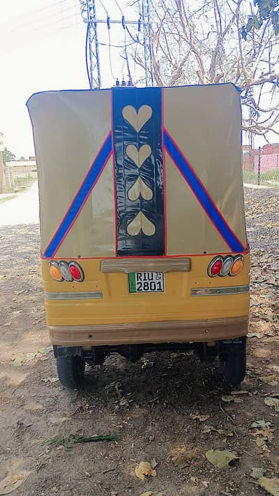 three seater rickshaw
