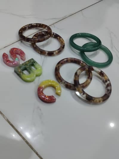 Resin made customize jewelry and frames available, msg for price