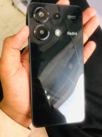 Xiaomi Redmi Note 13 with box and charger