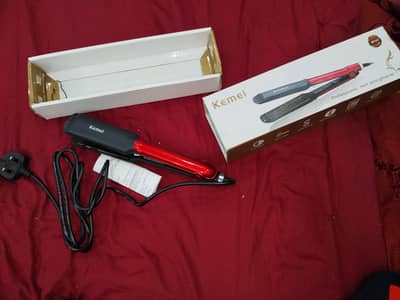 Kemei brand new hair straightener