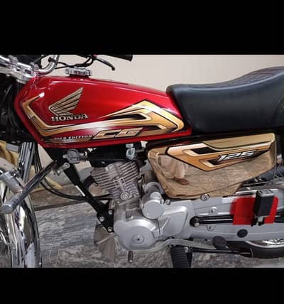 Honda 125 self start golden addition
