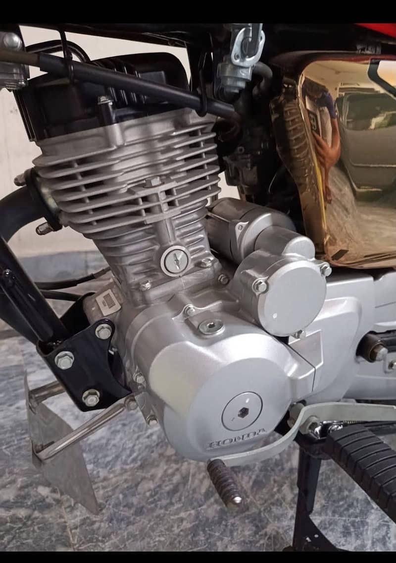 Honda 125 self start golden addition 5