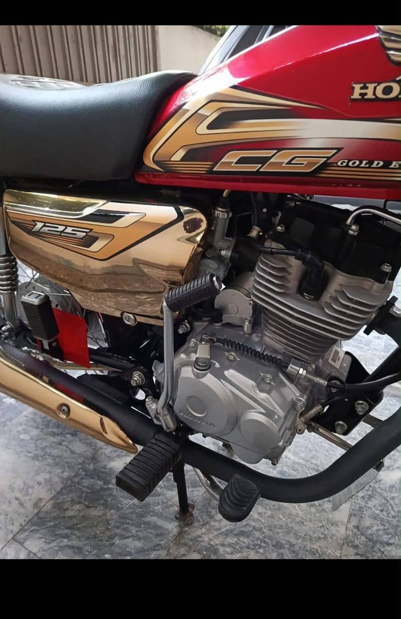 Honda 125 self start golden addition 6