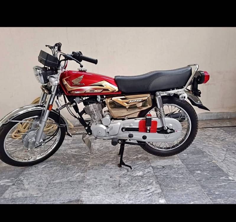 Honda 125 self start golden addition 8