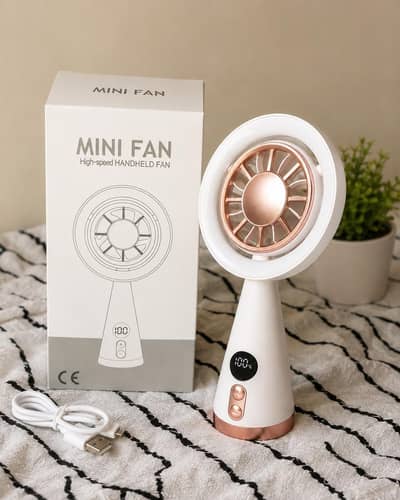 Premium Mini Handheld Fan – Portable & High-Speed Cooling