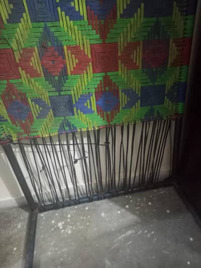 Charpoy with Telephone wire usage for grip and tightend