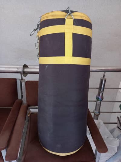 punching bag and boxing gloves for sale