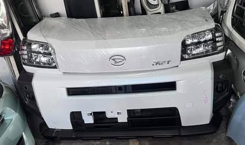 Daihatsu Taft bonnet fender headlights and bumper