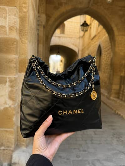 original chanel 22 quilted handbag black golden chain strap _preloved