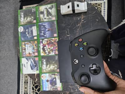 Xbox one x 1TB  with 9 dvds