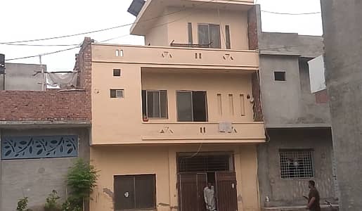 5 Marla house double story on 30ft road green cap opposite gajjumate metro station Lahore
