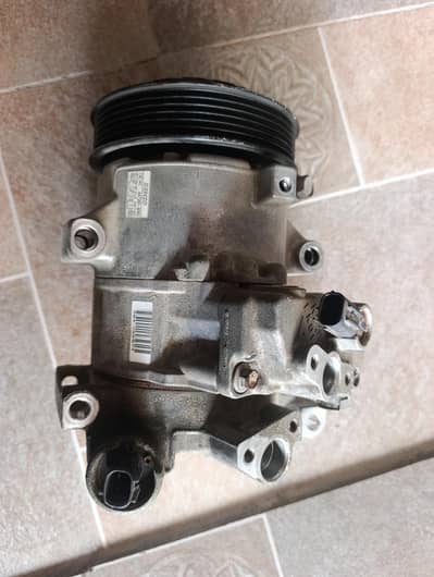 corolla Altis 1.6 2013 model genuine AC used complete parts