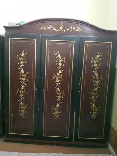 3 door wooden cupboard
