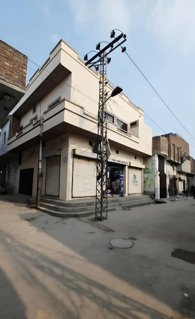 corner 4.5 marla commercial double story house with 3 shops for sell