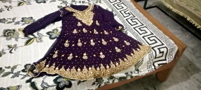 Heavy embroidered purple party wear dress